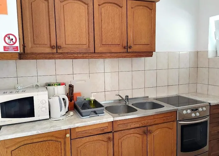 Apartment With Parking Space Barbat, Rab - 25045 *